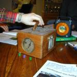 Some modern and some historical equipment for timing of pigeons during equipments. The small bits in front are modern rings for electronic clocking of pigeon arrivals. You can also see two older manual clocks which were used to time pigeon arrivals.